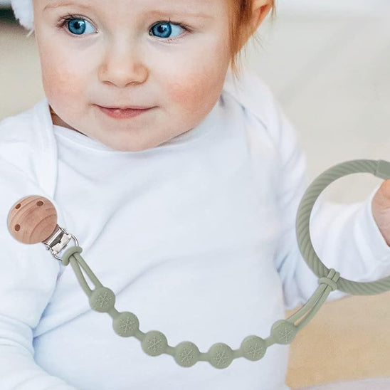 attache-tetine-amusante