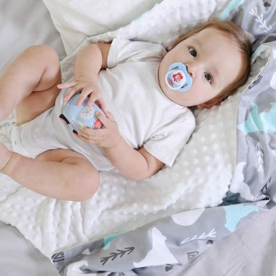 Couverture-enveloppante-bébé-confort-sensoriel